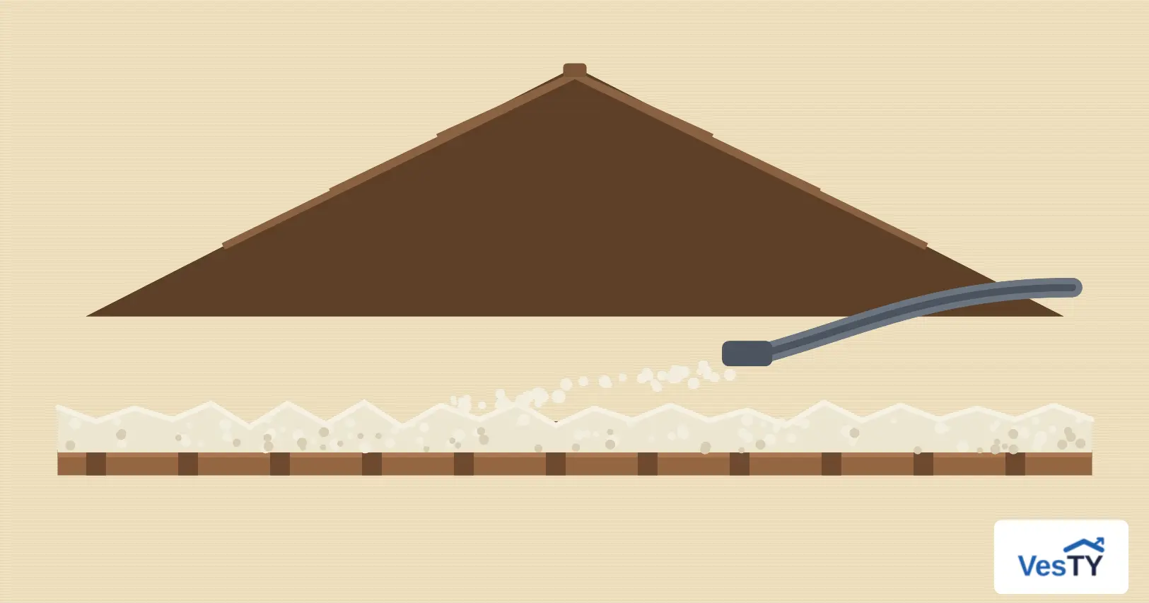 Soufflage d'un isolant en flocons sur le plancher de combles perdus